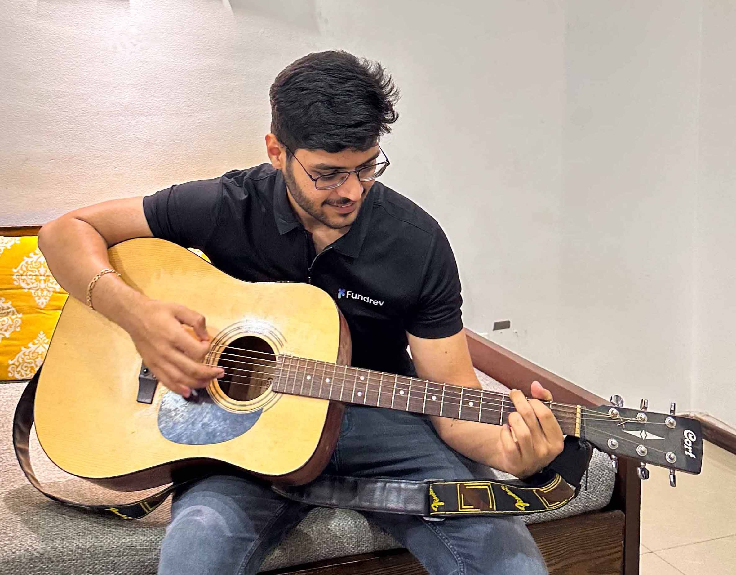 Henay Playing guitar